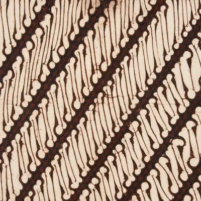 Diagonal pattern of brown lines on cream fabric