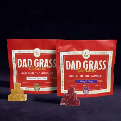 Two bags of dad grass next to each other